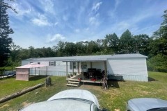Great Starter home. 5+/-acres with single wide w/ 3 bedrooms and 2 baths.